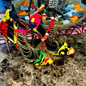 Colorful beautiful heels with a zip up closure. Almost like new worn only twice.